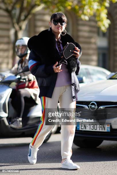 Leaf Greener , outside Thom Browne, during Paris Fashion Week Womenswear Spring/Summer 2018, on October 3, 2017 in Paris, France.
