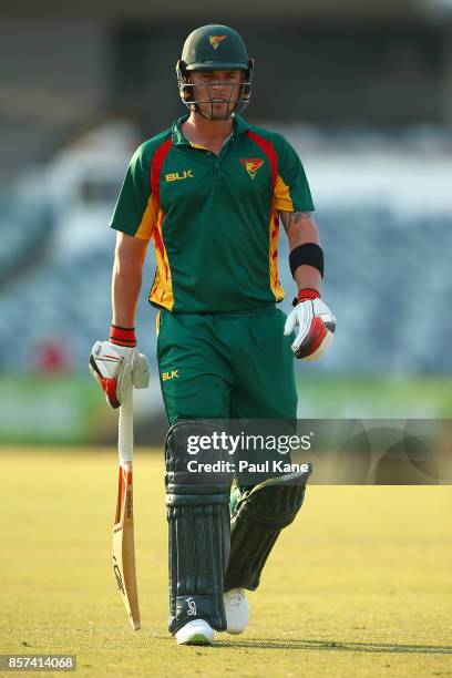 Ben McDermott of the Tigers walks from the field after being dismissed during the JLT One Day Cup match between Victoria and Tasmania at WACA on...