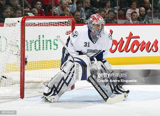 Karri Ramo of the Tampa Bay Lightning guards his net against the Montreal Canadiens at the Bell Centre on March 26, 2009 in Montreal, Quebec, Canada.