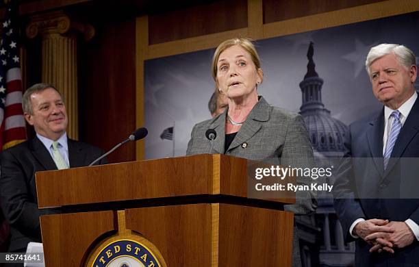 March 31: Senate Majority Whip Richard J. Durbin, D-Ill., left, and Rep. John B. Larson, D-Conn., looks on as Rep. Chellie Pingrie, D-Maine,...