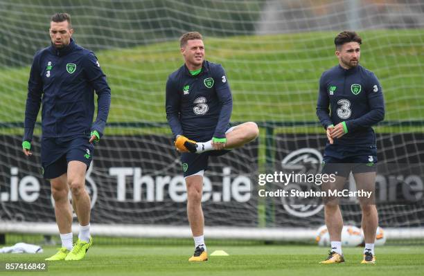 Dublin , Ireland - 4 October 2017; Republic of Ireland players, from left, Shane Duffy, James McCarthy and Sean Maguire during squad training at the...