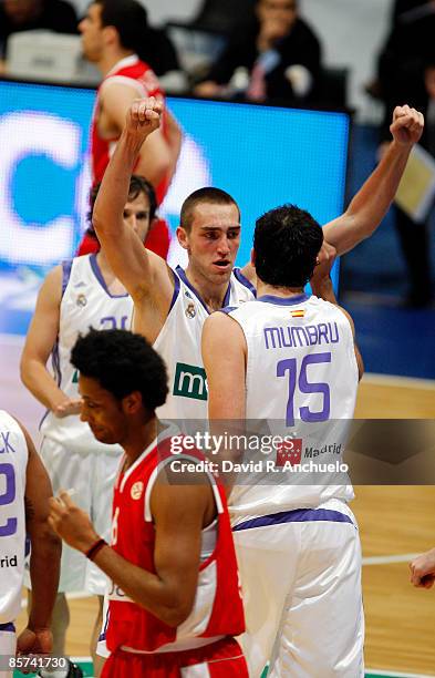 Axel Hervelle and Alex Mumbru of Real Madrid react during the Play off Game 3 between Real Madrid and Olympiacos Piraeus at Palacio Vistalegre on...