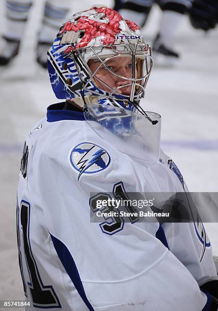 Karri Ramo of the Tampa Bay Lightning watches action during warm ups before the game against the Boston Bruins at the TD Banknorth Garden on March...