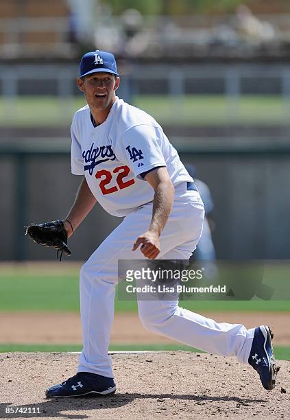 Clayton Kershaw of the Los Angeles Dodgers pitches during a Spring Training game against the Oakland Athletics at Camelback Ranch on March 30, 2009...