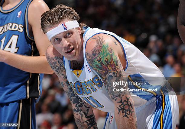 Chris Andersen of the Denver Nuggets stands on the court during the game against the Washington Wizards on March 20, 2009 at the Pepsi Center in...