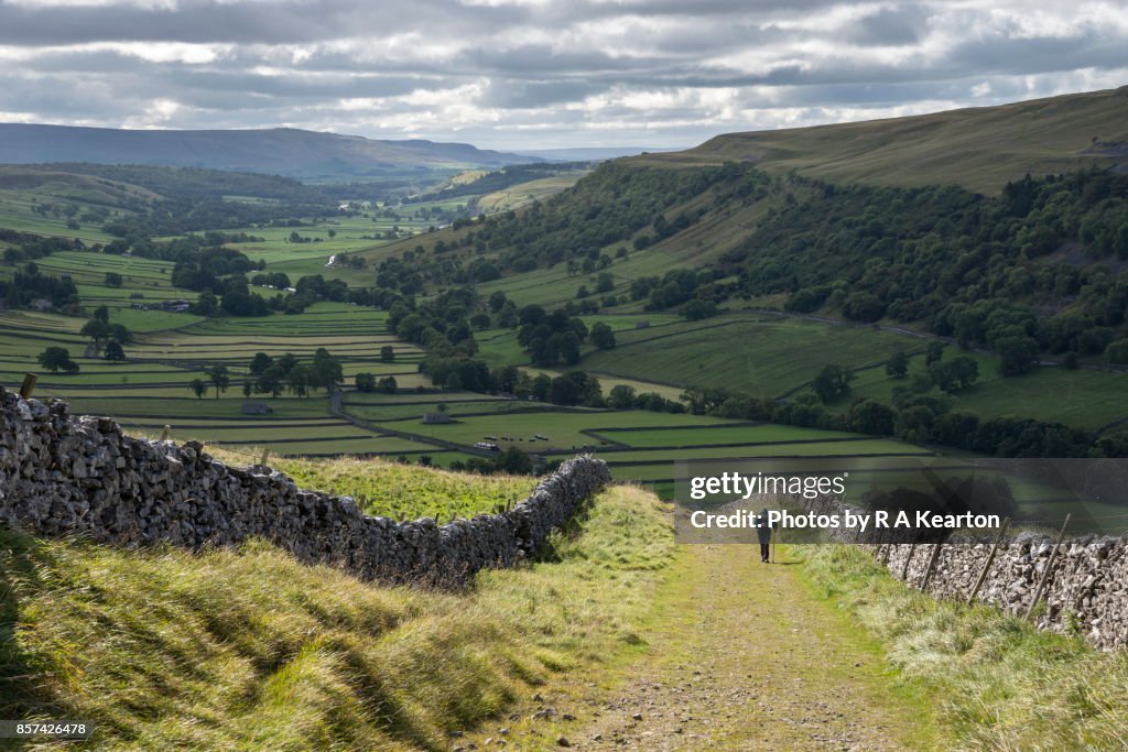 Elderly man hiking in the Yorkshire Dales national park, England
