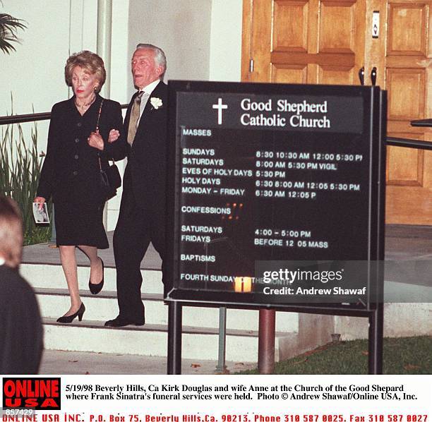 Beverly Hills, CA. Kirk Douglas and wife Anne at the Church of the Good Shepard where Frank Sinatra's funeral was held.