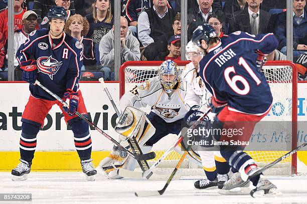 Goaltender Pekka Rinne of the Nashville Predators stops a shot from Rick Nash of the Columbus Blue Jackets during the second period on March 31, 2009...