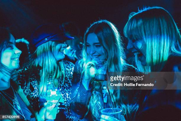 girlfriends on a night out - nightlife bar stock pictures, royalty-free photos & images