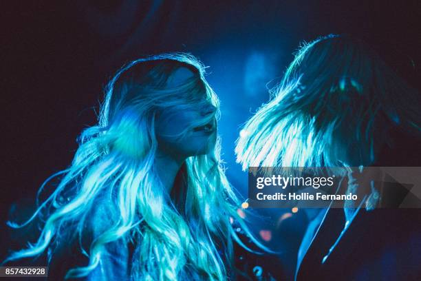 girlfriends on a night out - locale notturno foto e immagini stock
