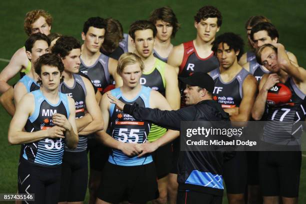 Western Bulldogs former player Brad Johnson gives footballer instructions during the AFLW Draft Combine at Etihad Stadium on October 4, 2017 in...