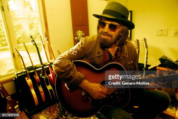 American musician, singer, and songwriter Tom Petty is photographed in his home for Los Angeles Times on September 27, 2017 in Malibu, California....