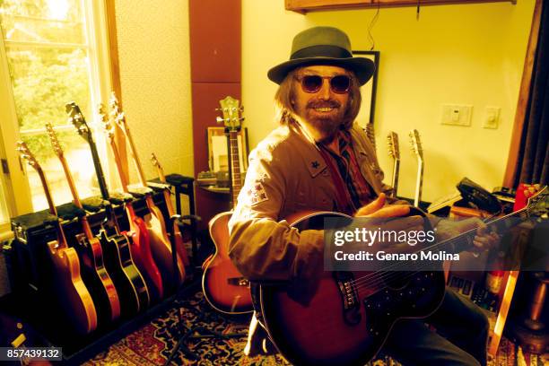 American musician, singer, and songwriter Tom Petty is photographed in his home for Los Angeles Times on September 27, 2017 in Malibu, California....