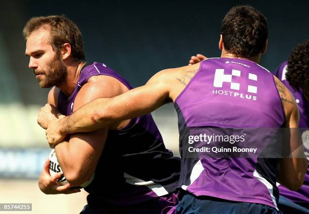 Scott Anderson of the Storm is tackled during a Melbourne Storm NRL training session at Visy Park on April 1, 2009 in Melbourne, Australia.