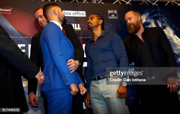 Tony Bellew and David Haye clash during a press conference at the Park Plaza Hotel on October 4, 2017 in London, England. Haye and Bellew will face...