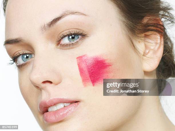 blusher on cheek - blusher make up stock pictures, royalty-free photos & images