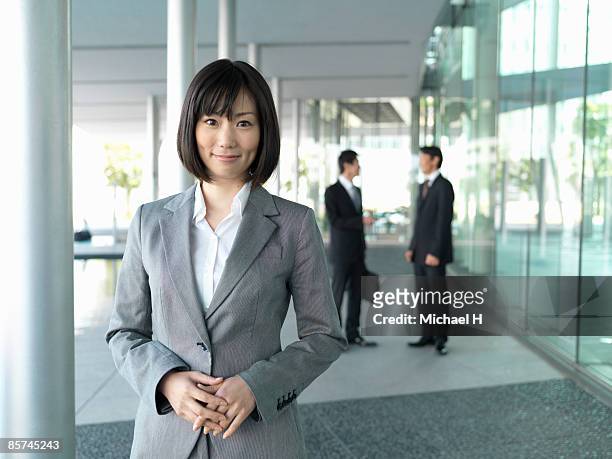 a business woman who overflowed in confidence. - スーツ ストックフォトと画像