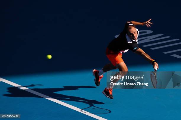 Steve Darcis of Belgium returns a shot against Dusan Lajovic of Serbia during the Men's singles second round on day five of 2017 China Open at the...