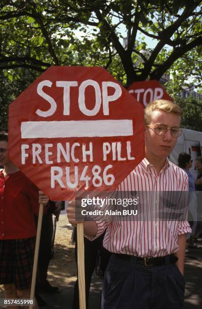 Manifestation devant le siege de Roussel-Uclaf contre la pilule abortive RU 486 le 21 juin 1993 a Paris, France.