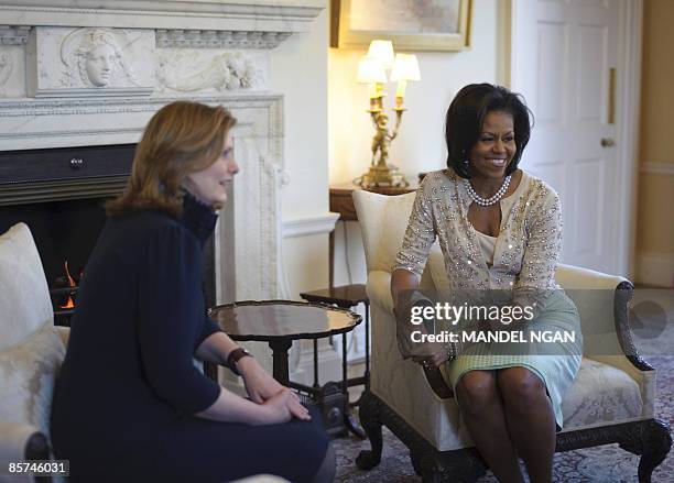 First Lady Michelle Obama poses with Sarah Brown, the wife of British Prime Minister Gordon Brown, at 10 Downing Street, in central London. Harry...