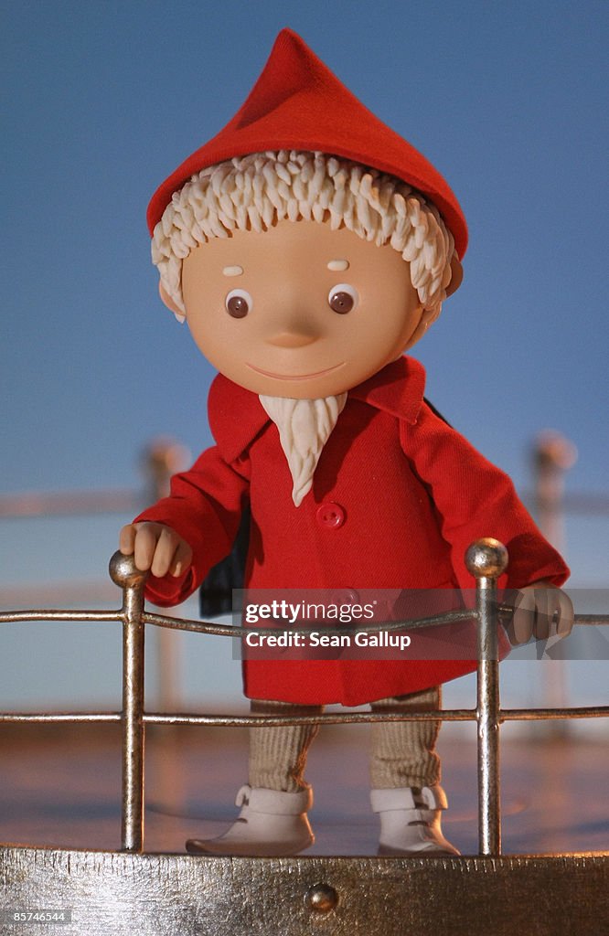Das Sandmann A Sandmaennchen figure looks out from his lighthouse perch on a film ...