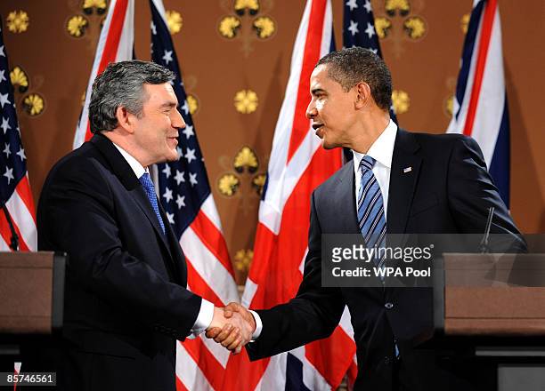 Britain's Prime Minister Gordon Brown and US President Barack Obama shake hands following a press conference at the Foreign and Commonwealth Office...
