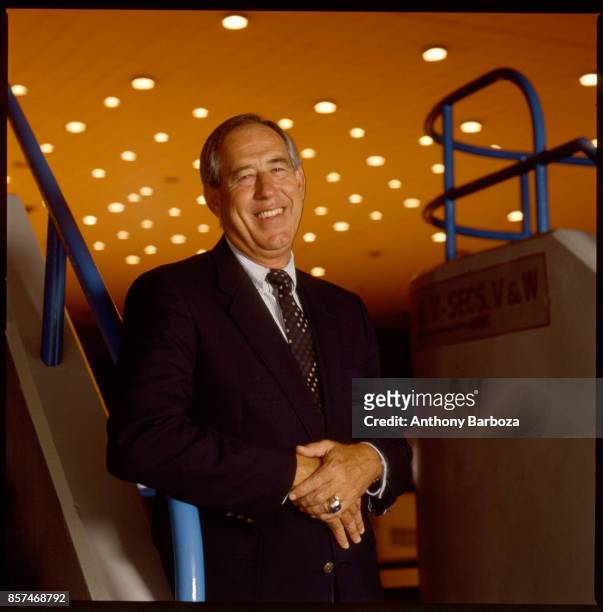 Portrait of American educational administrator University of Kentucky athletic director Charles Martin 'CM' Newton as he poses in a sports arena on...