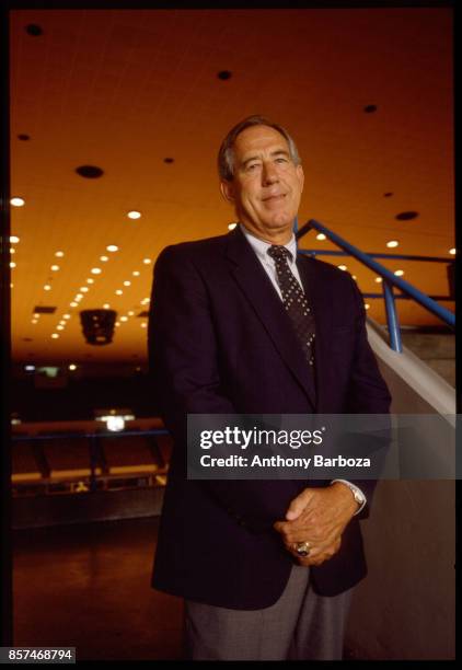 Portrait of American educational administrator & University of Kentucky athletic director Charles Martin 'CM' Newton as he poses in a sports arena on...