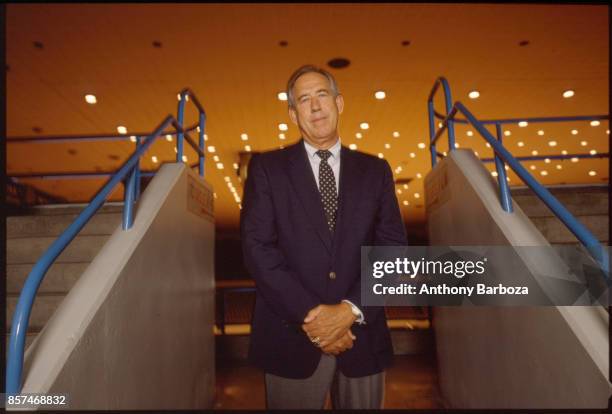 Portrait of American educational administrator University of Kentucky athletic director Charles Martin 'CM' Newton as he poses in a sports arena on...