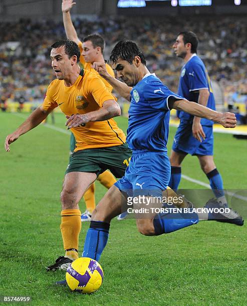 Socceroo Richard Garcia attempts to block Uzbekistan's Jasur Hasanov's kick during the Asian World Cup football qualifier in Sydney on April 1, 2009....