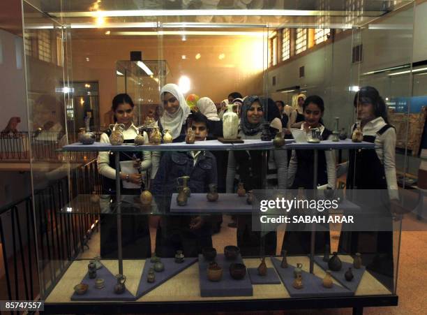 Iraqi schoolchildren and their teacher visit Baghdad's national museum on April 1, 2009. Iraq has revealed that it found 4,000 antiquity pieces...