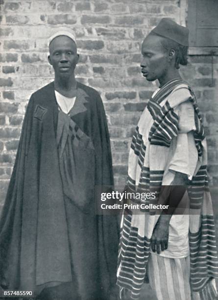 Two Mandingos from north-western Liberia, 1912. From The Living Races of Mankind, Vol. II. [Hutchinson & Co, London, 1912]. Artist Harry Johnston.