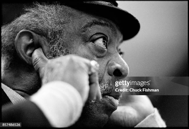 Close-up of American Jazz and Swing musician Count Basie as he plugs his ears during a studio rehearsal, New York, New York, January 1982.