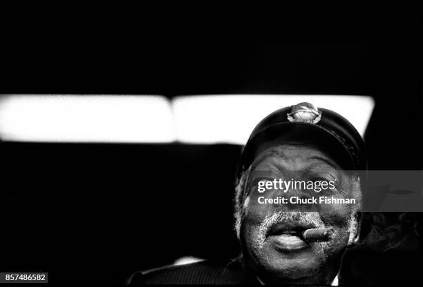 Close-up of American Jazz and Swing musician Count Basie as he smokes a cigar during a studio rehearsal, New York, New York, January 1982.