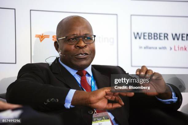 Ben Magara, chief executive officer of Lonmin Plc, speaks during a panel discussion on the opening day of the Investing in African Mining Indaba in...