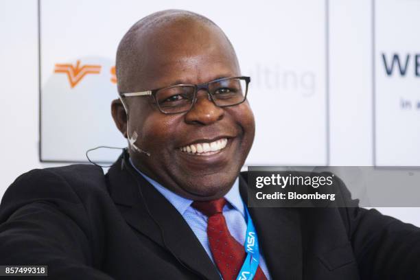 Ben Magara, chief executive officer of Lonmin Plc, reacts during a panel discussion on the opening day of the Investing in African Mining Indaba in...