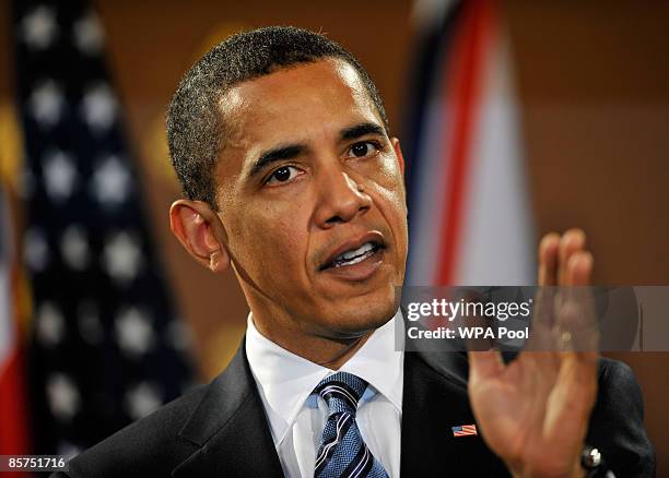 President Barack Obama speaks during a press conference with Britain's Prime Minister Gordon Brown and at the Foreign and Commonwealth Office on...