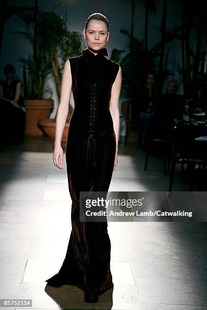 Model walks the runway at the Azzedine Alaia Ready-To-Wear A/W 2009 fashion show during Paris Fashion Week on March 12, 2009 in Paris, France.