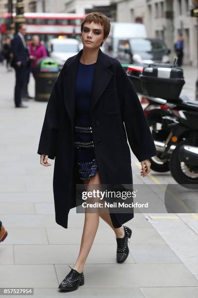 Cara Delevingne arriving at Waterstones Piccadilly for her 'Mirror, Mirror' book signing on October 5, 2017 in London, England.