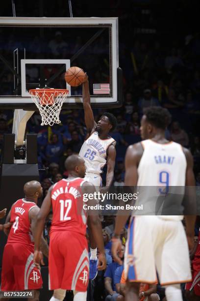 Daniel Hamilton of the Oklahoma City Thunder dunks during the preseason game on October 3, 2017 at the BOK Center in Tulsa, Oklahoma. NOTE TO USER:...