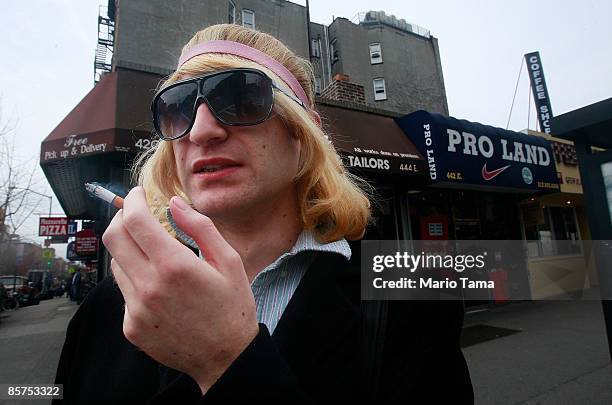 Alex Radman smokes a cigarrette on a street corner April 1, 2009 in New York City. Today the federal tax on packs of cigarettes climbed from 39 cents...