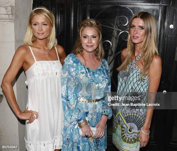 Paris Hilton, Kathy Hilton and Nicky Hilton attends the opening of "The Good Life" photographs by Murray Garrett and Slim Aarons at the Photographers...
