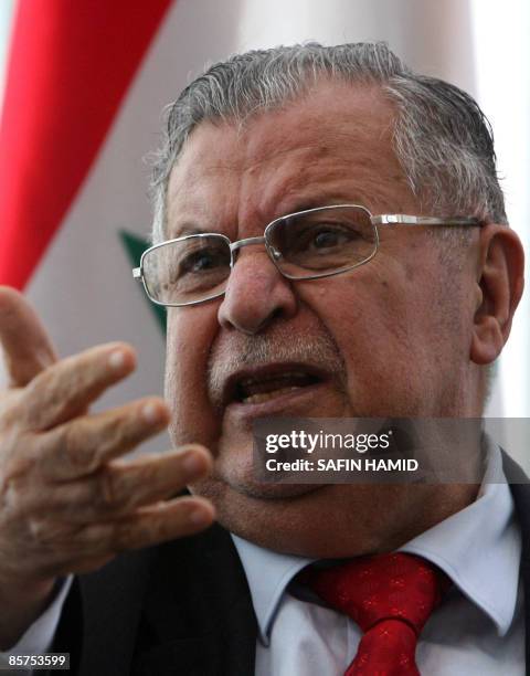 Iraqi President Jalal Talabani gestures as he speaks in the northern city of Arbil on April 1, 2009.