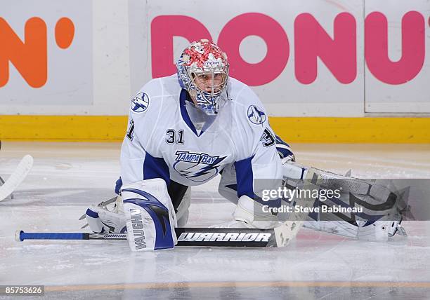 Karri Ramo of the Tampa Bay Lightning stretches before the game against the Boston Bruins at the TD Banknorth Garden on March 31, 2009 in Boston,...