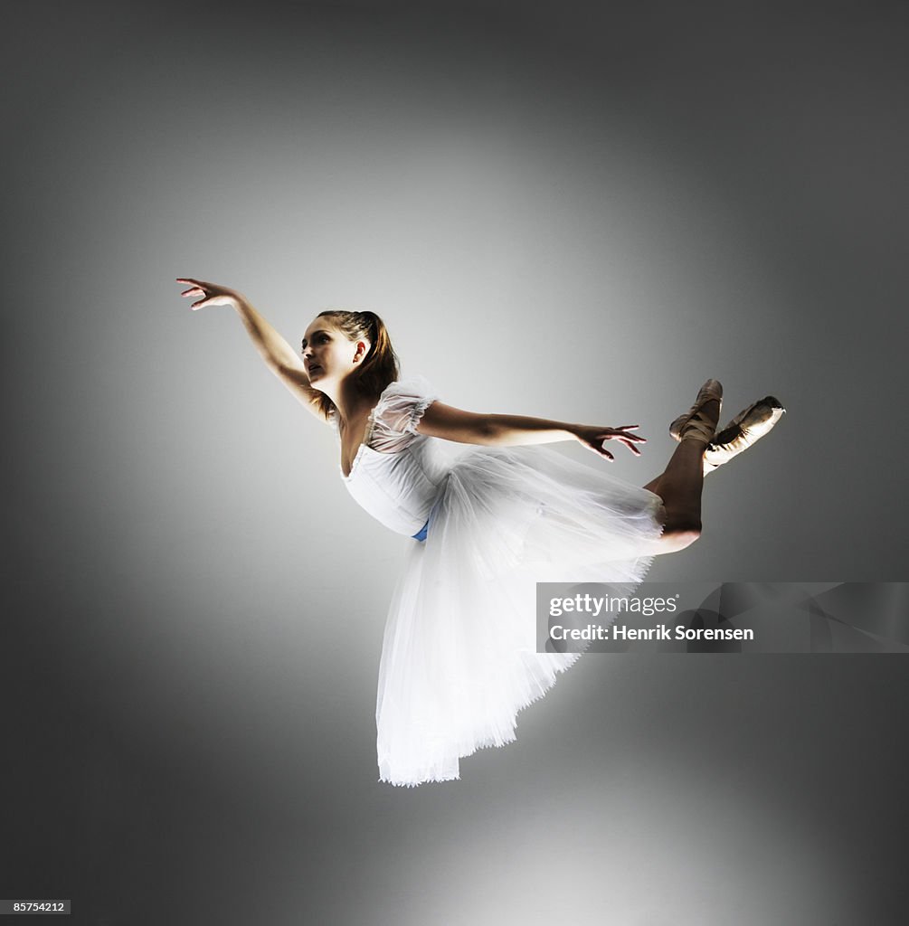 Ballerina hanging in the air