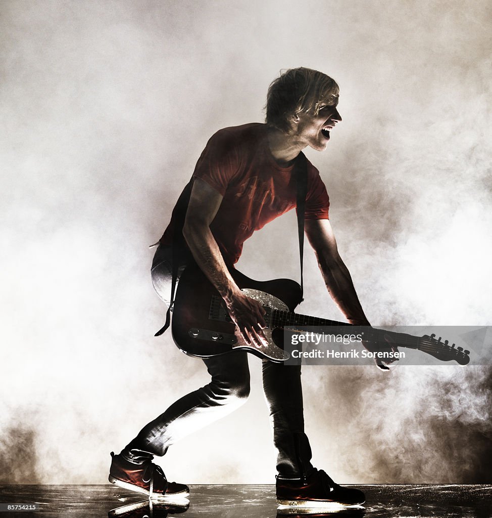 Rock Star with his guitar.