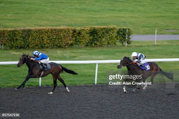 Dane O'Neill riding Mushahadaat win The 32Red.com/British Stallion Studs EBF Maiden Fillies' Stakes at Kempton Park racecourse on October 4, 2017 in...