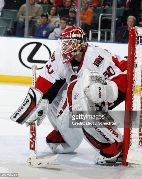 Goaltender Brian Elliott of the Ottawa Senators defends the net against the Florida Panthers at the Bank Atlantic Center on March 31, 2009 in...