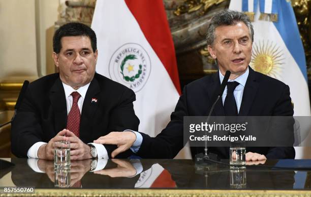 Horacio Cartes president of Paraguay and Mauricio Macri president of Argentina answer questions to media during a press conference at Casa Rosada as...