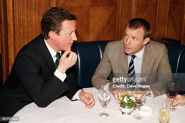 David Cameron and Guy Ritchie attend the book launch for Charlie Brook's new book 'Citizen' at Tramp, Jermyn Street on April 1, 2009 in London,...